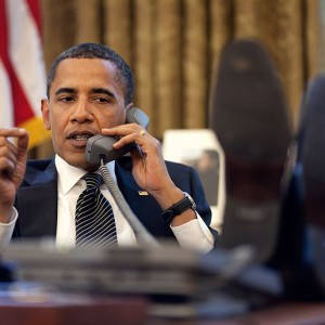 Barack Obama On The Phone In The Oval Office