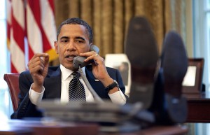 Barack Obama On The Phone In The Oval Office